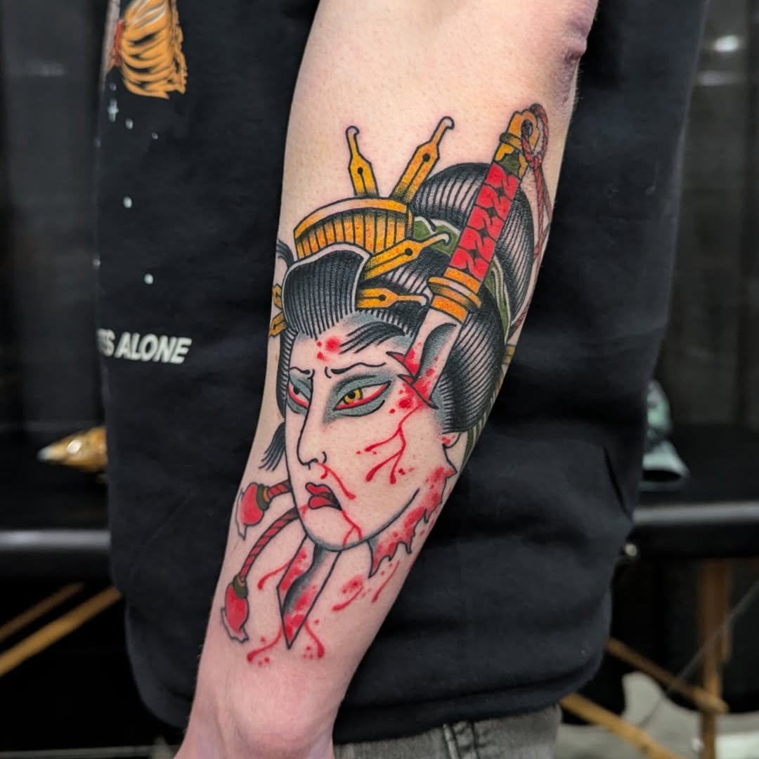 Geisha with sword traditional tattoo by Rikki Kander